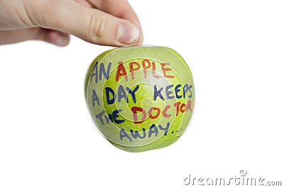 Cropped image of hand holding a granny smith apple with sayings text over white background Stock Photo