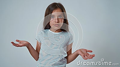Cropped image of little girl with skeptical face Stock Photo