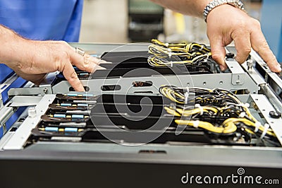 Cropped image of male technician examining computer card slots i Stock Photo