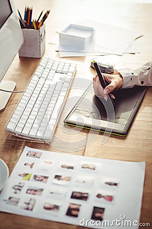 Cropped image of woman using graphics tablet Stock Photo