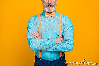 Cropped photo of handsome cool clothes grandpa hands crossed not smiling perfect groomed mustache beard wear blue shirt Stock Photo