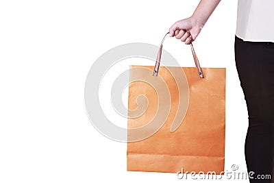 Cropped portrait image of young lady holding shopping bag isolated on white Stock Photo