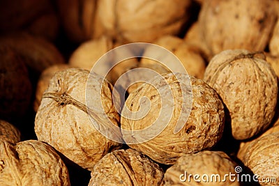 Cropped shot of walnuts. Abstract food background. Walnuts in a paper bag. Stock Photo