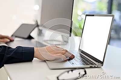 Cropped and side view, Professional male programmer or web developer using laptop computer Stock Photo