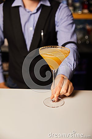 Cropped view of barman holding margarita Stock Photo