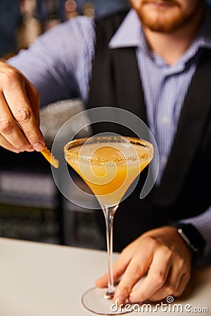 Cropped view of barman holding margarita Stock Photo