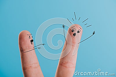 View of frightened finger and zombie isolated on blue Stock Photo