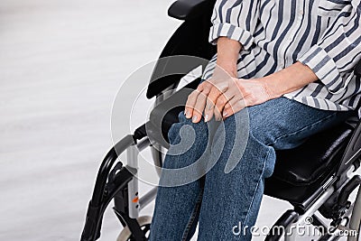 Cropped view of pensioner in wheelchair Stock Photo