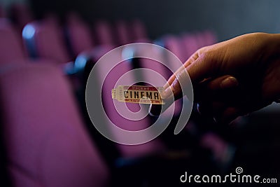 cropped view of person holding cinema ticket Stock Photo