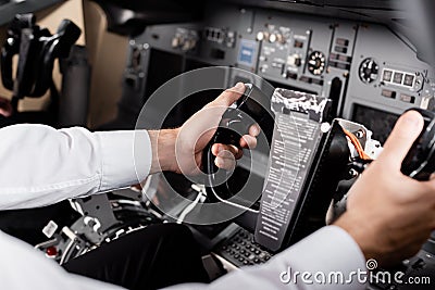 cropped view of pilot using yoke Stock Photo