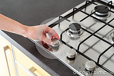 Modern kitchen gas stove cooker with metal burner on countertop Stock Photo