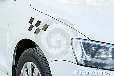 Cropped white car with a sigh taxi on it Stock Photo