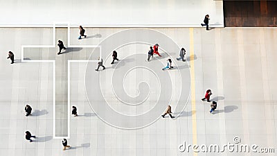 Cross on an aerial view of a crowd of people walking. Conceptual with copy space Stock Photo