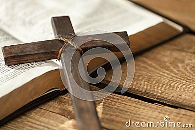 Cross on bible Stock Photo