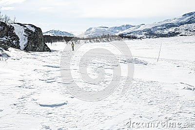 a cross country skier is on the way in a splendid, breathtaking winter landscape - Norway, Jotunheim Stock Photo