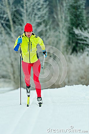 Cross-country skiing classic technique practiced by woman Stock Photo