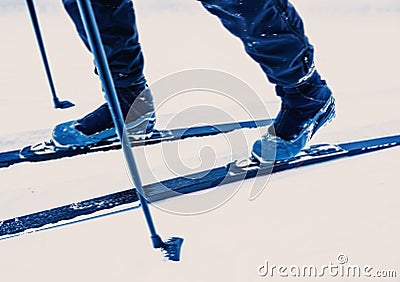 Cross-country skiing. Close up of boots an skis in motion with speed blur Stock Photo