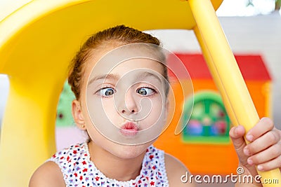 Cross eyed squinting expression little girl Stock Photo