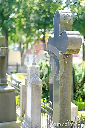 Cross headstone on grave Stock Photo