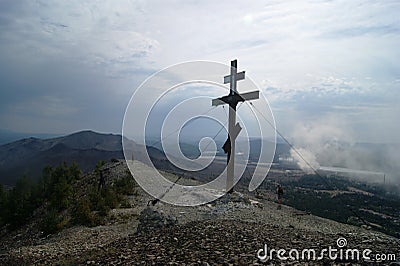 Cross on a high mountain near Karabash city in Russia, summer Editorial Stock Photo