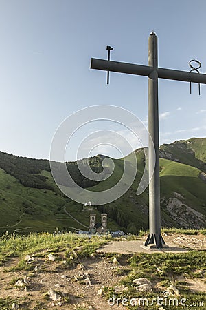 Cross on the hill above the Sanctuary of La Salette in the French Alps associated with the apparition of Our Lady Stock Photo