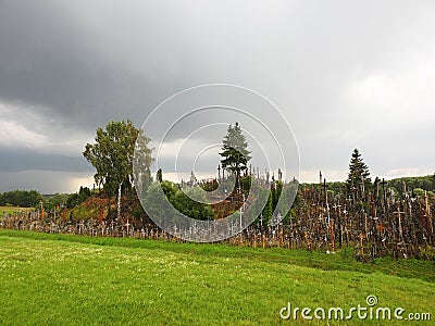 Cross hill before rain, Lithuania Stock Photo
