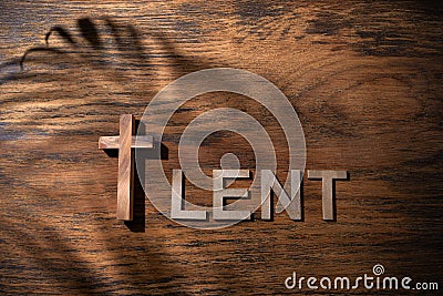 Cross and Lent word as fast and abstinence period concept. Top view Stock Photo