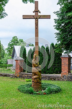 Cross near St. Church of the Visitation of the Virgin Mary in Gelvonai Editorial Stock Photo
