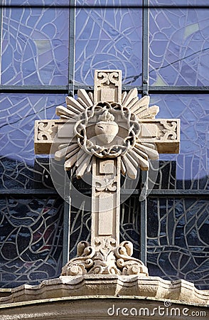 Cross on portal of Parish Church of the Holy Blood in Graz Stock Photo