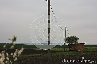 cross power lines in the field Stock Photo