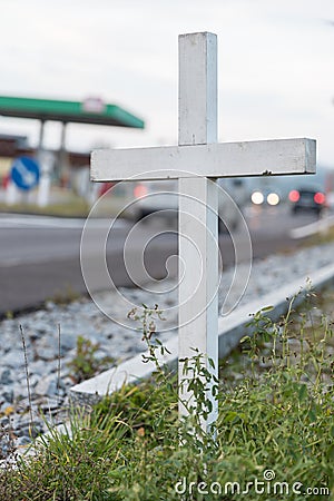 Cross on the roadside - traffic deaths Stock Photo