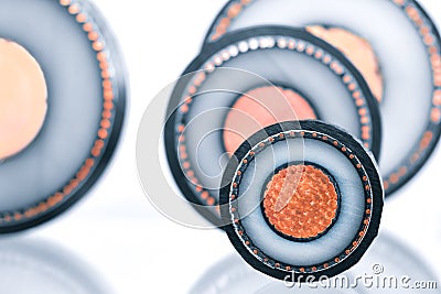 Cross section of high-voltage cable, polymer insulation. Close-up of some high voltage copper cable cross-section. Abstract focus Stock Photo