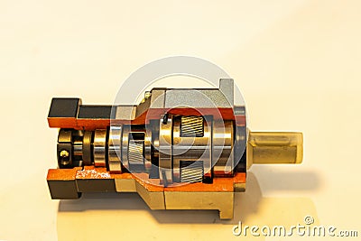 Cross section show detail and system cogs bearing and other inside precision planetary gear box set for reduce ratio spin speed Stock Photo