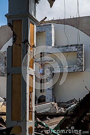 Only cross standing church destroyed Stock Photo