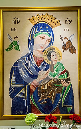 Cross stitch of Mother Mary, Mother of Perpetual Help at Sacred Heart Church Seattle Washington Editorial Stock Photo
