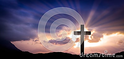 Cross at sunset. Christian background Stock Photo