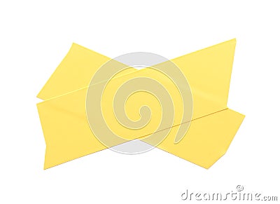 Cross of yellow insulating tape isolated on white, top view Stock Photo