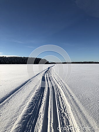 Crosscountry skiing on A Finnish lake Stock Photo