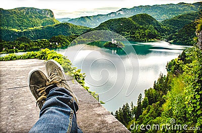 Crossed feet lake aerial bled slovenia relax travel Stock Photo