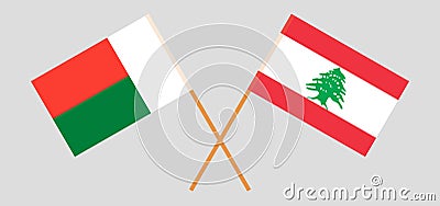 Crossed flags of Lebanon and Madagascar Vector Illustration