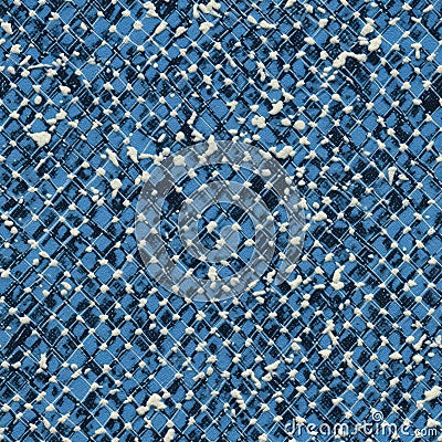 A crosshatched denim texture with splattered paint detail, perfect for urban-inspired designs and creative textile Stock Photo