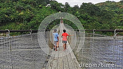 Crossing the Hanging Bridge Editorial Stock Photo