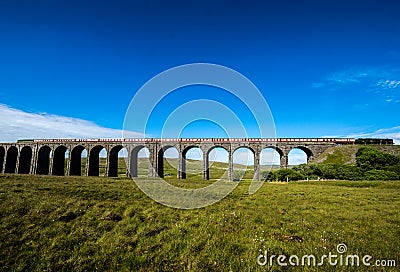 Crossing Ribblehead Viaduct, North Yorkshire, UK Stock Photo