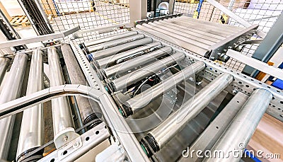 Crossing of the roller conveyor Stock Photo