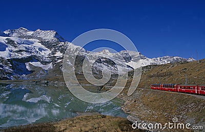 Crossing the swiss alps via Train trip at Lago Bianco, Stock Photo