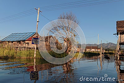 Crossroads in the village on the lake Editorial Stock Photo