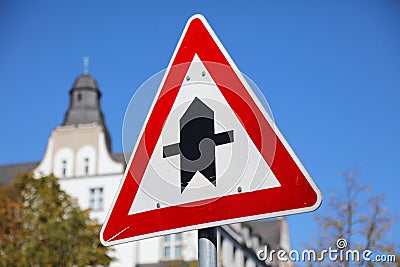 Crossroads warning sign in Europe Stock Photo