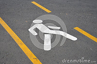 Crosswalk. Road marking in the form of a human figure Stock Photo