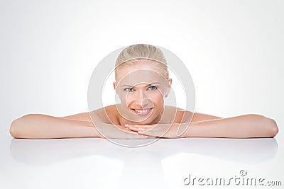 Crouched nordic beauty with sparkling smile Stock Photo