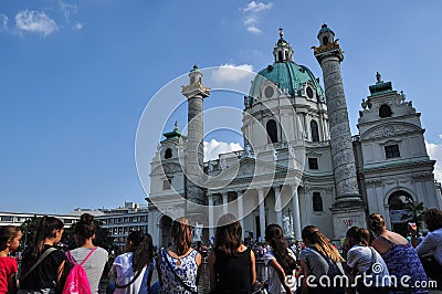 Croud of Tourists at the Karlskirche, St. Charles church in the center of Vienna Editorial Stock Photo
